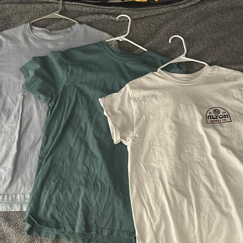 Surf shirts. You can buy one if you want to, or all three Let me know.